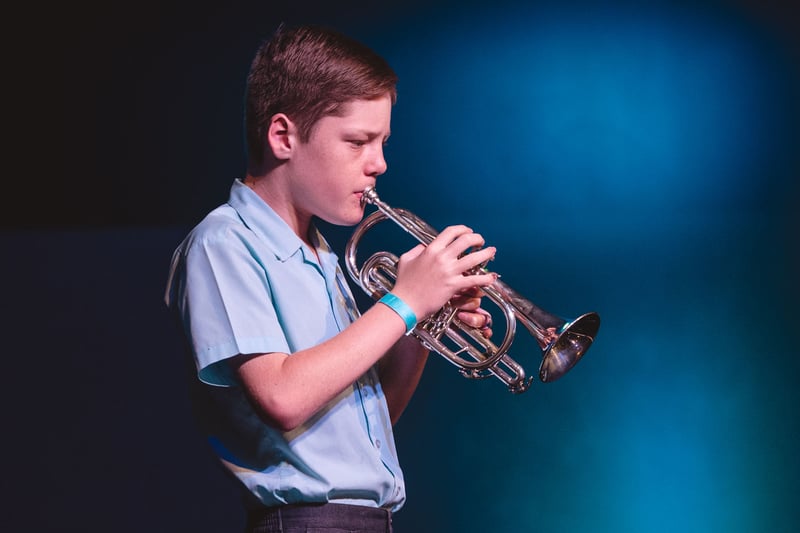 King's student playing the trumpet